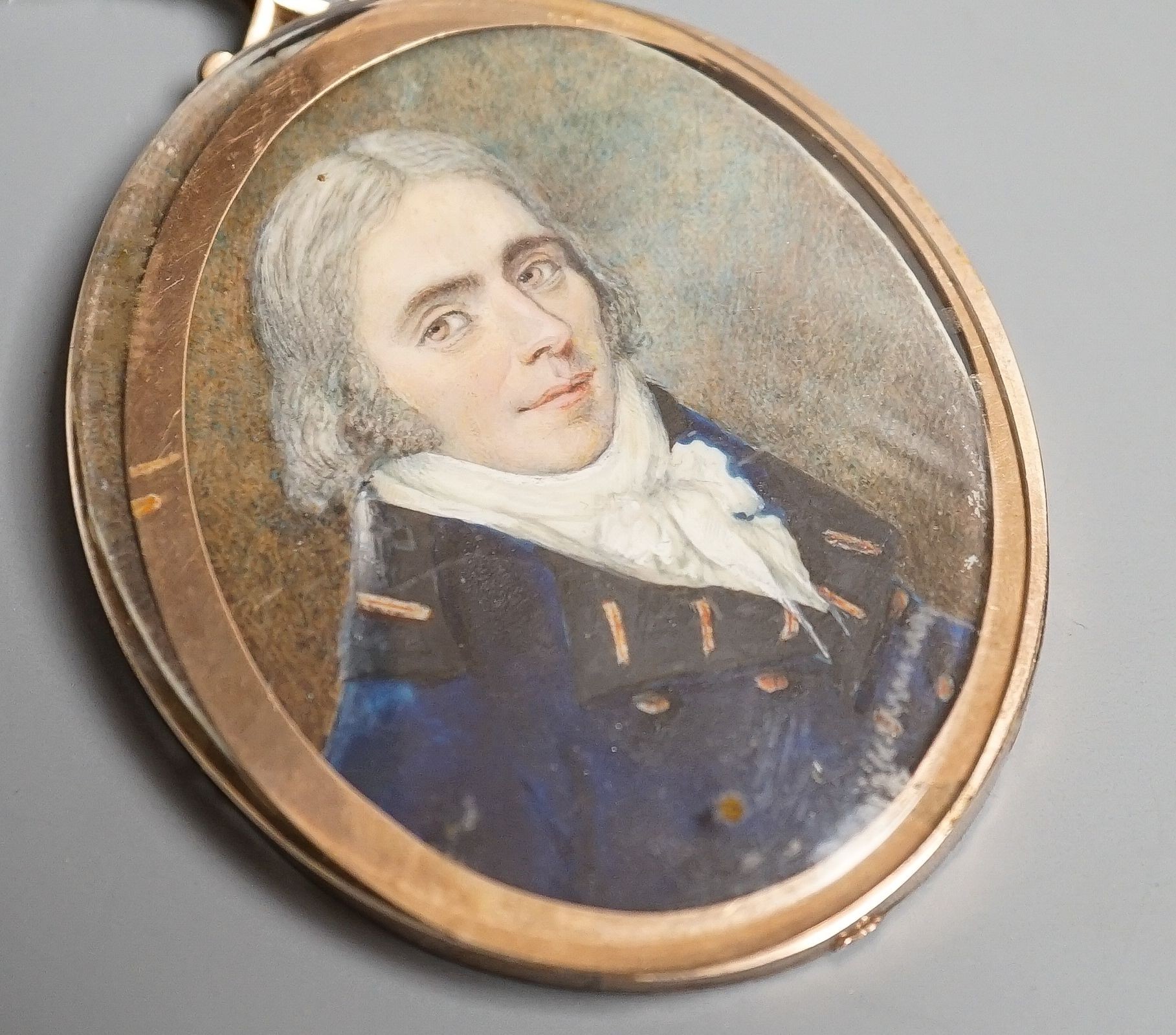 A 19th century portrait miniature on ivory of a gentleman in naval uniform, height 7cm
